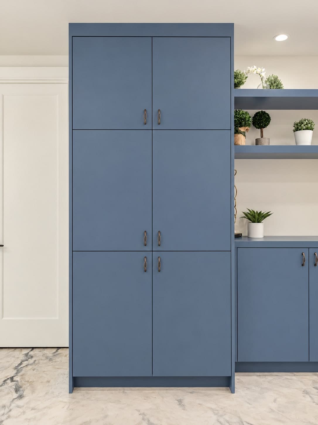 Tall blue storage cabinet with six doors, beside the floating shelves